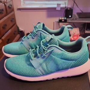 Nike Turquoise Sneakers with Orange Accents